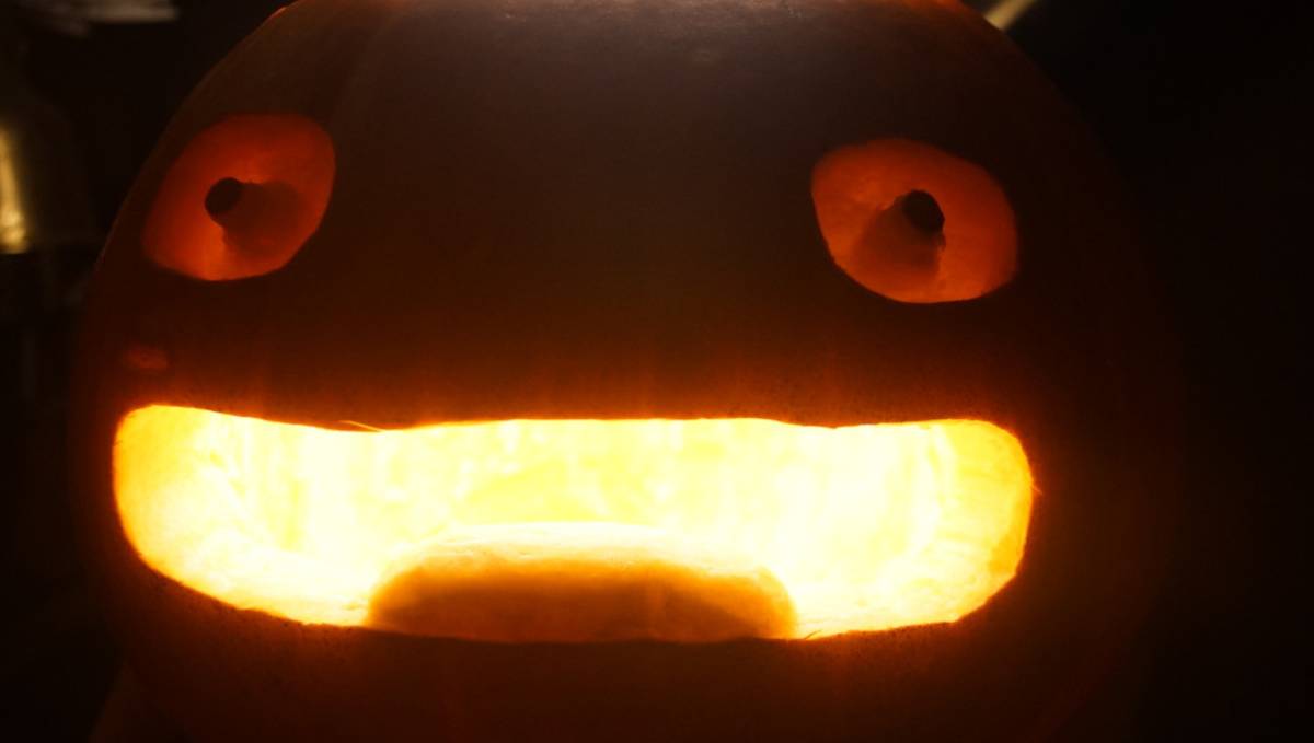 calcifer pumpkin A photo of calcifers face carved onto a pumpkin