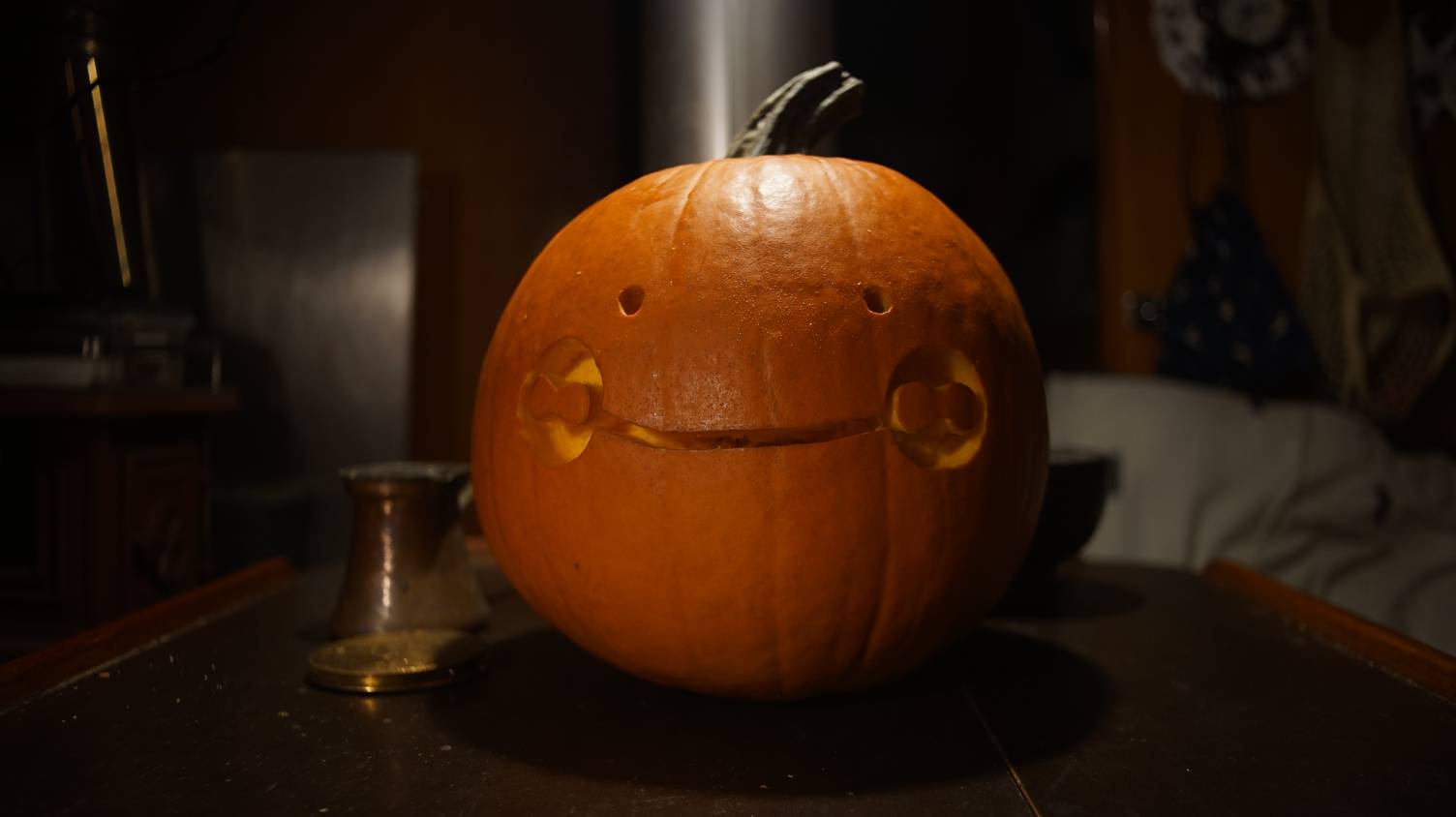 Uxn pumpkin A photo of an Uxn face carved onto a pumpkin