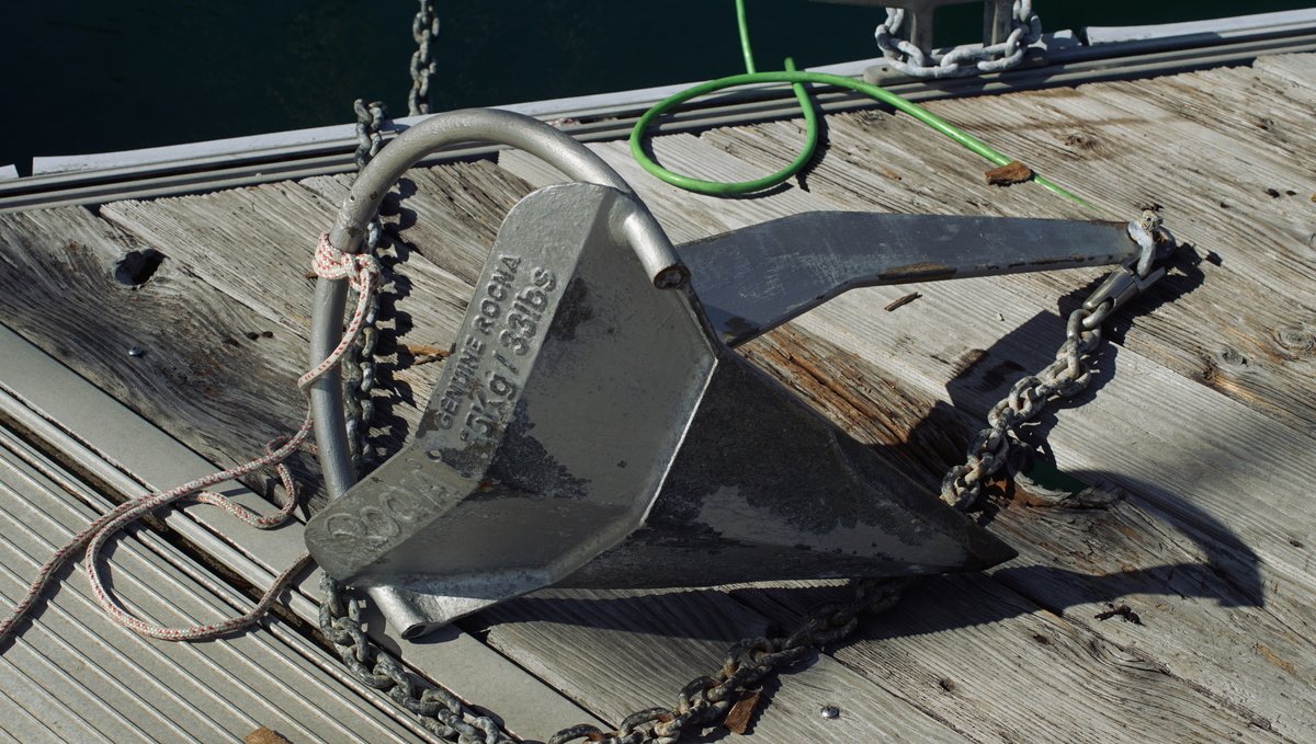 Our second larger 15kg/33lbs Rocna anchor A photo of a 15kg Rocna anchor laying over its side on a dock