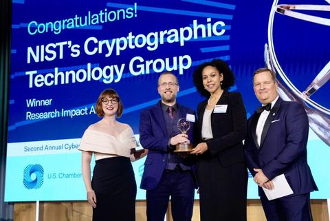 Carl Miller and Angela Robinson receive Research Impact Award