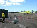 Fire bomber Airtractor 802 being reloaded at Orleans Farm (Tagon) airstrip, close to Cape Arid National Park, Esperance, November 2014.
