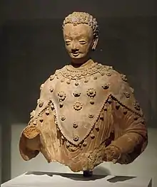Statue of the Buddha wearing the Iranian three-pointed chamail, Ghorband valley, Fondukistan monastery, circa 700 CE.