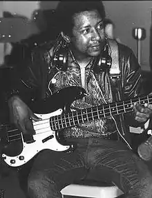 Cox playing a Fender Precision Bass c. late 1960s