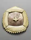 Breast Ornament (civa vonovono); c. 1850; whale ivory, pearl shell and fiber; height: 12.7 centimetres (5.0&nbsp;in), diameter: 17.78 centimetres (7.00&nbsp;in); from Fiji; Los Angeles County Museum of Art