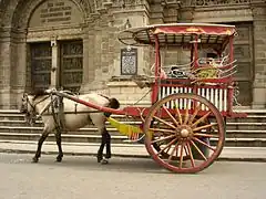 Image 1Kalesa, a traditional Philippine urban transportation, in front of Manila Cathedral entrance (from Culture of the Philippines)