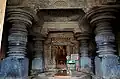 The inside view of Akkana Basadi, Shravanabelagola(1181 A.D.); Parshvanatha (centre), Yaksha Dharanendra (left) and Yakshini Padmavati (right)