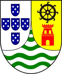 Portuguese India(1935–1961)Yellow with a black mill wheel above a red tower.