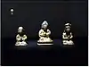 Vairocana Buddha (middle figure), 1628.  Gilt bronze, h. 12.6&nbsp;cm.  Monk (left), 1628. Giltbronze, h. 9.7&nbsp;cm.  National Museum of Korea.