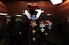 Dunham's uniform on display aboard USS&nbsp;Jason Dunham