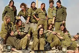 Tank combat instructors after a military drill, 2013