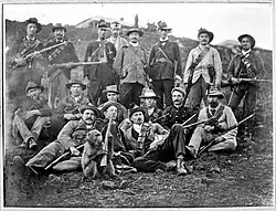 Viljoen and his Commando, Pelgrimsrus district (Pilgrim's Rest, South Africa). A baboon with a rifle, 1901.