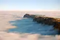 Comanche Point centered, as seen from Desert View during a rare total inversion