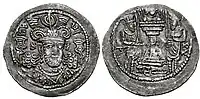Coin of Peroz. Gandhara mint. Obverse: Bust facing, wearing crown with ram’s horns surmounted by korymbos and ribbons. Brahmi legend Pi-ro./ Reverse: Fire altar flanked by two attendants.