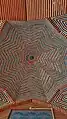 Some peripheral domes feature colored tiles as well as brick