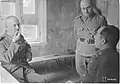 Kirpichnikov conversing with Oesch, with Lt. Georg Baronin as an interpreter