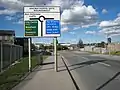 Road from the industrial estate to the A63 roundabout