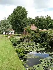 The Drawbridge and moat on the western side of the hall.