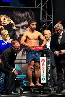Image 13Manny Pacquiao, the only 8-division world boxing champion in history. (from Culture of the Philippines)