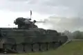 A German Army Marder fires its Rh202 20 mm cannon on a training exercise.