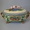Gun dog Game Pie Dish, 17.3 ins., coloured and mottled glazes, naturalistic in style.