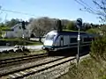 A local train arrives at the station