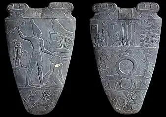 Both sides of the Narmer Palette; circa 3100 BC; greywacke; height: 63&nbsp;cm (243⁄4 in.); from Hierakonpolis (Egypt); Egyptian Museum (Cairo). The Narmer palette is the quintessential statement of the Egyptians' mythology of kingship. A clear manifesto of royal power, it is also one with multiple layers of symbolism