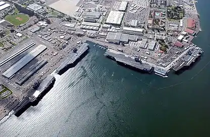 Four carriers (USS&nbsp;Constellation, USS&nbsp;Carl Vinson, USS&nbsp;Nimitz, USS&nbsp;John C. Stennis) at North Island, 2002