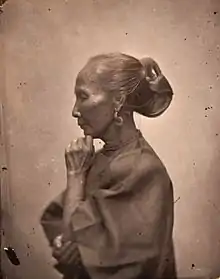 Old Chinese woman with elaborate hair style. John Thomson. China, 1869. The Wellcome Collection, London