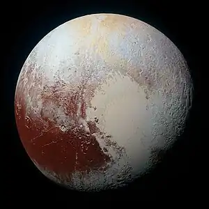 Image 5PlutoPhotograph: NASA / Johns Hopkins University Applied Physics Laboratory / Southwest Research InstitutePluto is a dwarf planet in the Kuiper belt, a ring of bodies beyond Neptune. Discovered by Clyde Tombaugh in 1930, Pluto was originally considered to be the ninth planet from the Sun. Following the discovery of several objects of similar size in the Kuiper belt, its status as a planet was questioned, and in 2006 the International Astronomical Union (IAU) gave a definition of the term "planet" that excluded Pluto. The largest and second-most-massive known dwarf planet in the Solar System, Pluto is primarily made of ice and rock. It is relatively small, with a moderately eccentric and inclined orbit.This photograph of Pluto is a composite of four near-true color images taken by the New Horizons spacecraft in 2015. The most prominent feature in the image, the bright, youthful, nitrogen ice plains of Sputnik Planitia, the left lobe of heart-shaped Tombaugh Regio, is at right center. This contrasts with the darker, more cratered terrain of Cthulhu Macula at lower left.More selected pictures
