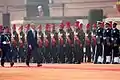 U.S. President Barack Obama inspecting the company with Pooja Thakur in 2015.