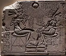Relief of the royal family: Akhenaten, Nefertiti and the three daughters; 1352–1336&nbsp;BC; painted limestone; 25 × 20&nbsp;cm; Egyptian Museum of Berlin (Germany)