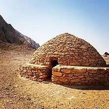 Image 10A Hafit era 'beehive' tomb at Mezyad – Jebel Hafeet Desert Park, Al Ain, Eastern Region of Abu Dhabi (from History of the United Arab Emirates)