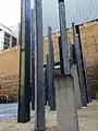 Side view of installation work with museum entrance at the background