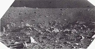 Angular blocks, up to 2 metres (6&nbsp;ft 7&nbsp;in) in diameter, which form part of a strewn field of blocks that surround a sharp-rim crater 3 metres (9.8&nbsp;ft) in diameter