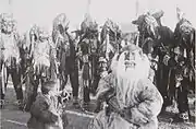 The last Great Khüree Cham- dance festival in Mongolia before organised Buddhism was wiped out, the festival was organised in 1937. The central figure in the photo is the deity of the Old White Man, the most comic character in the cham.