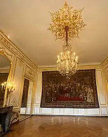 The 17th century Franco-Swiss Alliance Tapestry in the Hôtel de Besenval. In the foreground King Louis XIV (right) and the Swiss politician  Johann Heinrich Waser. Tapestry from the series Histoire du Roi.