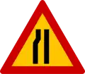 K-6αRoad narrows on left