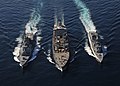 JS Ikazuchi and JS&nbsp;Kongō replenish with USNS&nbsp;Tippecanoe on 5 December 2010.
