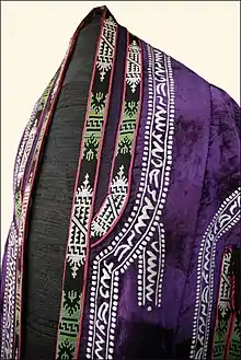 Image 7A parandja, a robe worn by women until it was banned in 1927. This example is made of velvet, silk threads and handmade embroidery. Displayed at the Museum of Applied Arts in Tashkent, Uzbekistan. (from Culture of Uzbekistan)