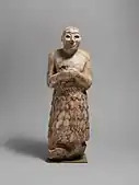 Votive figure; 2600–2350 BC; stone; height: 41.3&nbsp;cm, width: 14.5&nbsp;cm, depth: 13.5&nbsp;cm; Metropolitan Museum of Art